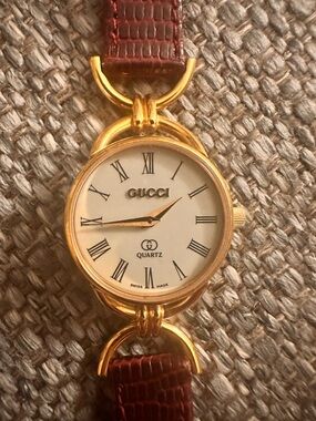 Gucci Gold-Tone Round Dial Watch with Burgundy Leather Strap